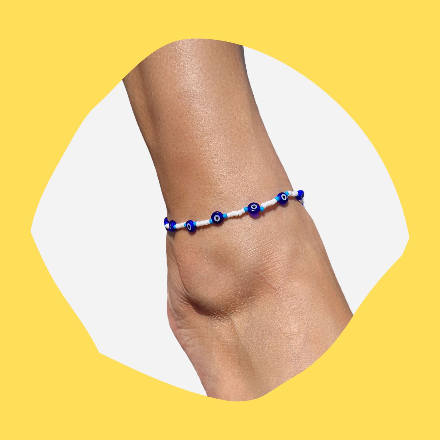 Χειροποίητο Βραχιόλι Ποδιού από Λευκές-Γαλάζιες Χάντρες και Ματάκια