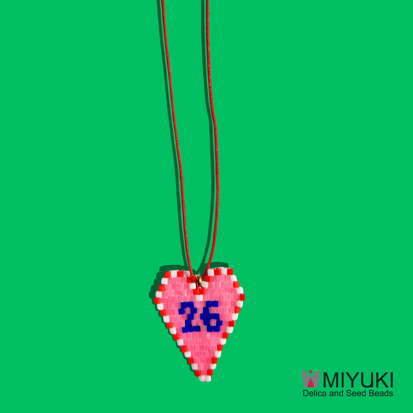 Χειροποίητο Κολιέ Ροζ Καρδιά Γούρι 26 από Χάντρες MIYUKI και Κόκκινο Κούμπωμα Μακραμέ