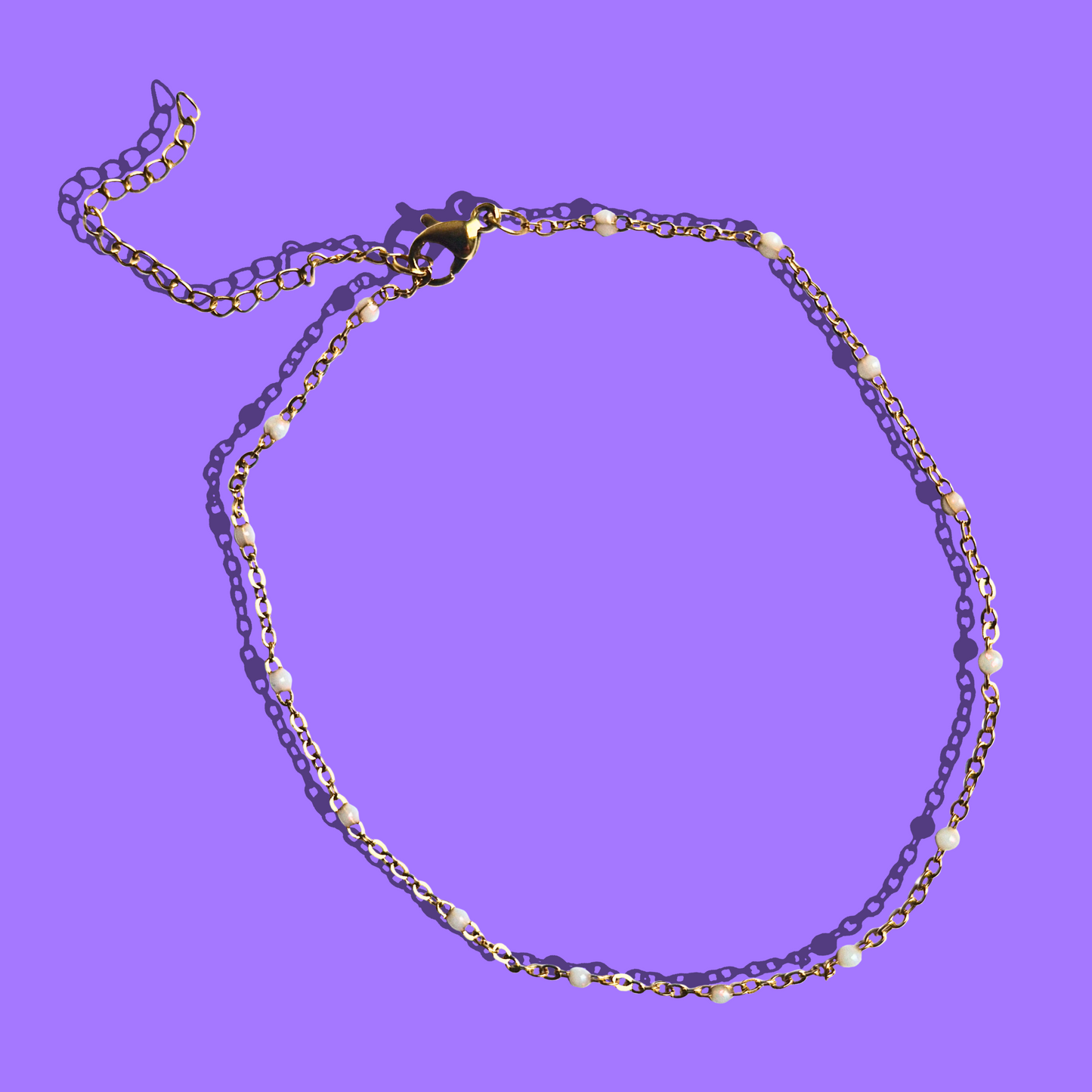 Βραχιόλι Ποδιού από Ατσάλινη Χρυσή Αλυσίδα με Λευκές Χάντρες