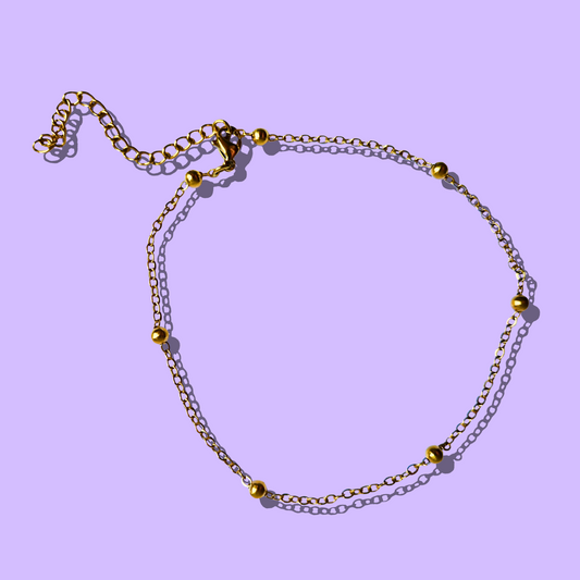 Βραχιόλι Ποδιού από Ατσάλινη Χρυσή Αλυσίδα με Χρυσές Μπιλίτσες